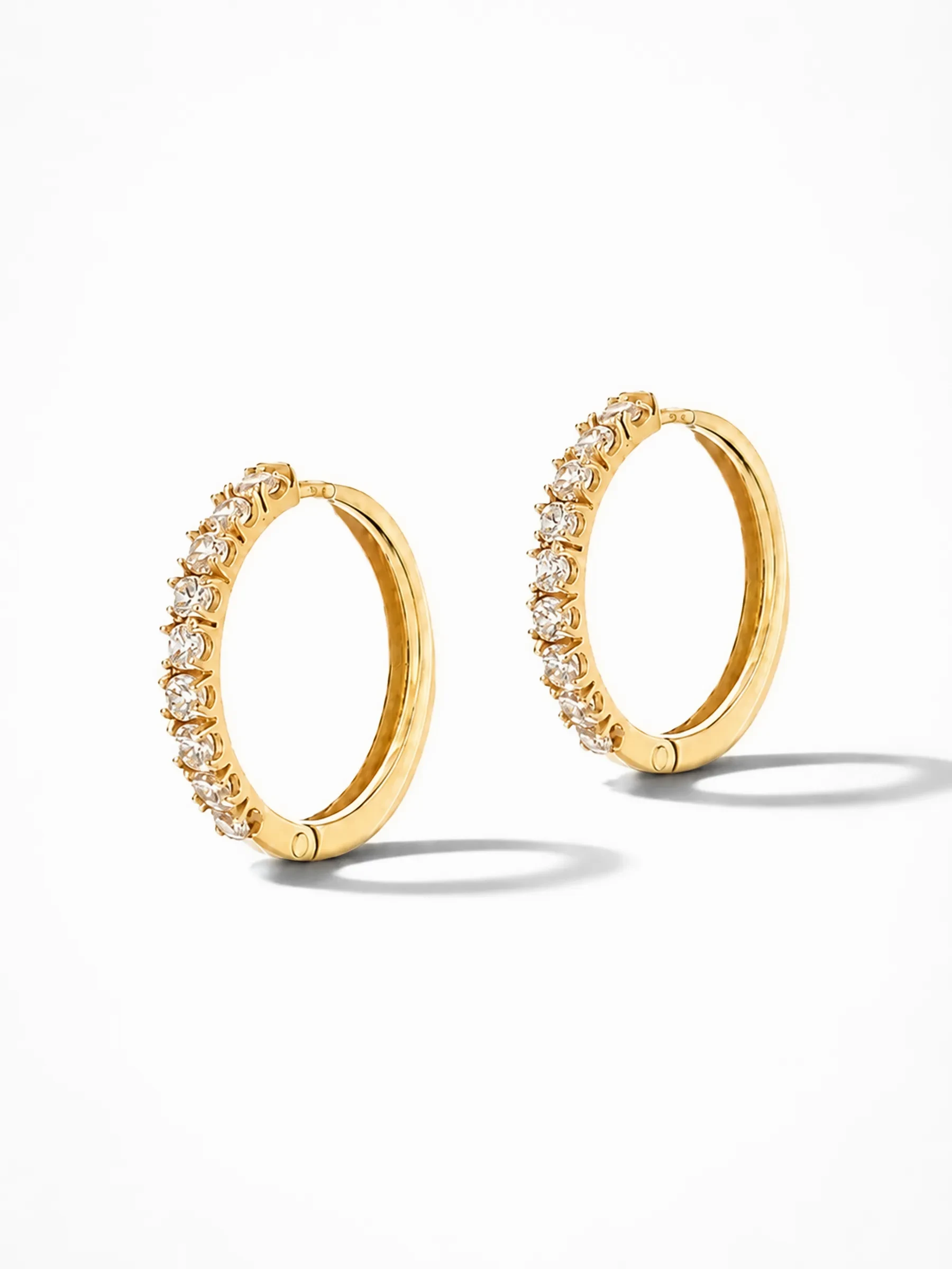 Gouden Oorbellen Huggy Loops Zirkonia Copain Medium